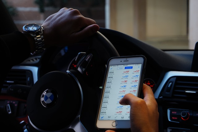 A person trading cryptocurrency through a phone app.