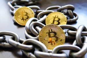 Three Bitcoins on a table 