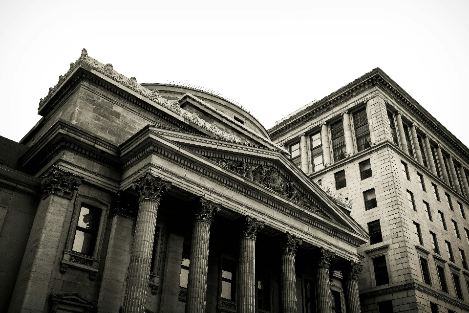 A modern central bank building symbolizing the rise of Central Bank Digital Currencies (CBDCs) in the evolving financial landscape.