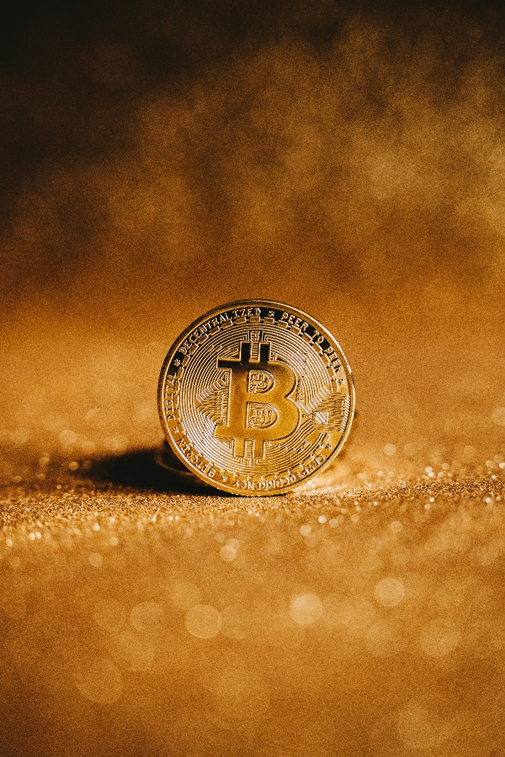 Close-up image of a physical Bitcoin coin symbolizing institutional crypto investment