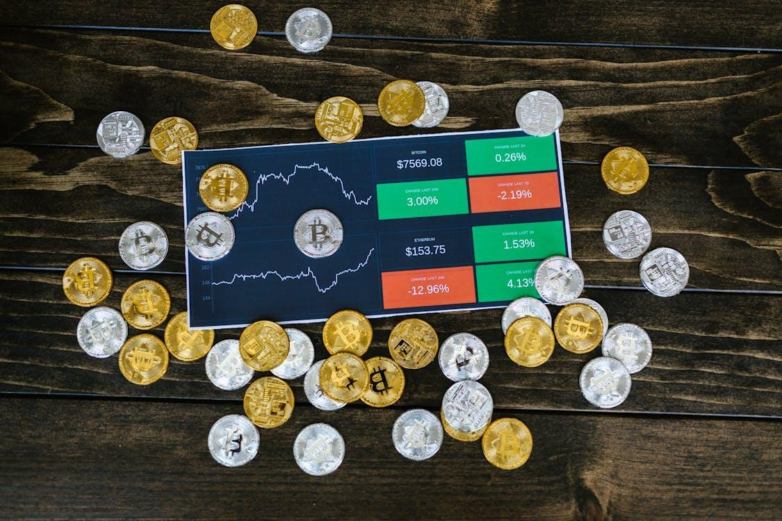 gold and silver coins on the table