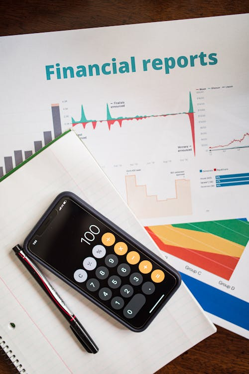 a document and calculator on the table