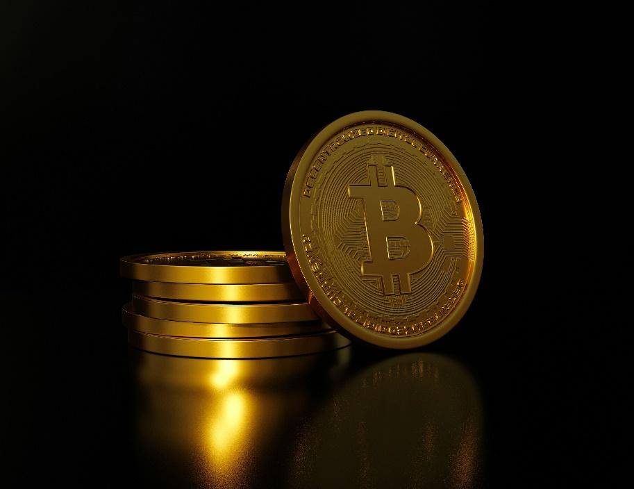 Two gold digital coins representing value and liquidity.