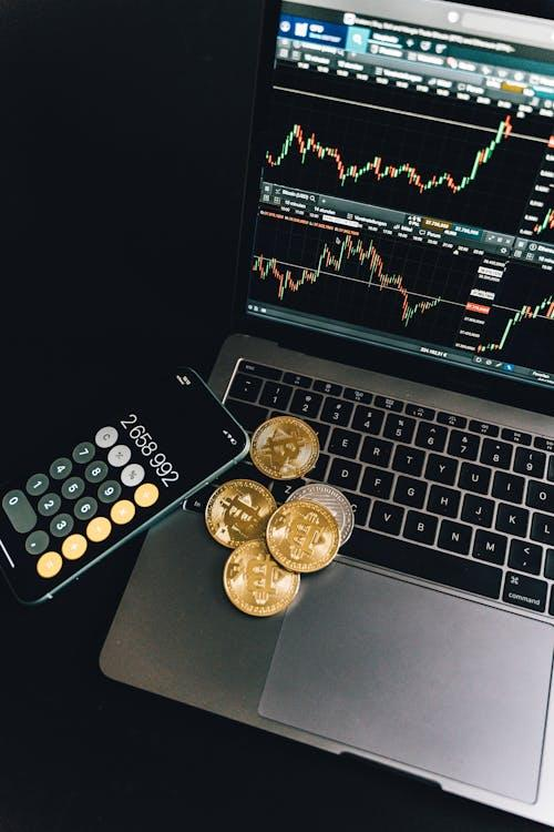 A stylized image of the Bitcoin logo in gold set against a dark digital background.