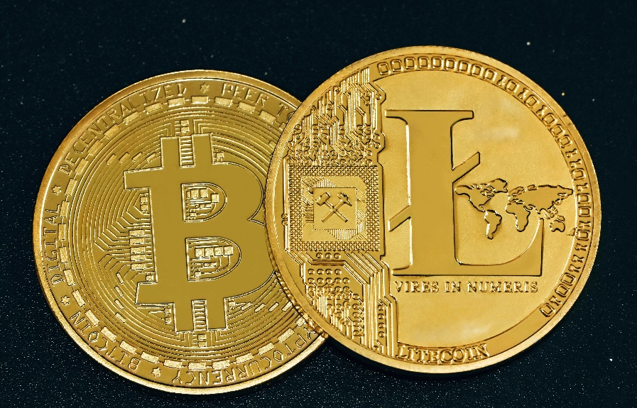 Close-up of a gold Bitcoin representing digital asset markets