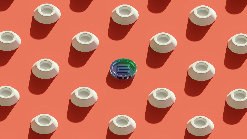 A single, glowing Solana cryptocurrency coin stands out.