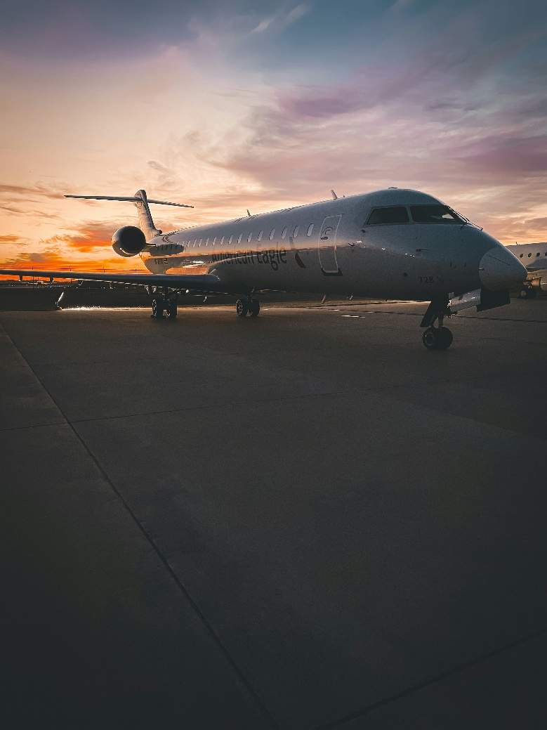 Commercial aircraft on runway at sunset, representing tokenized aviation leasing opportunities