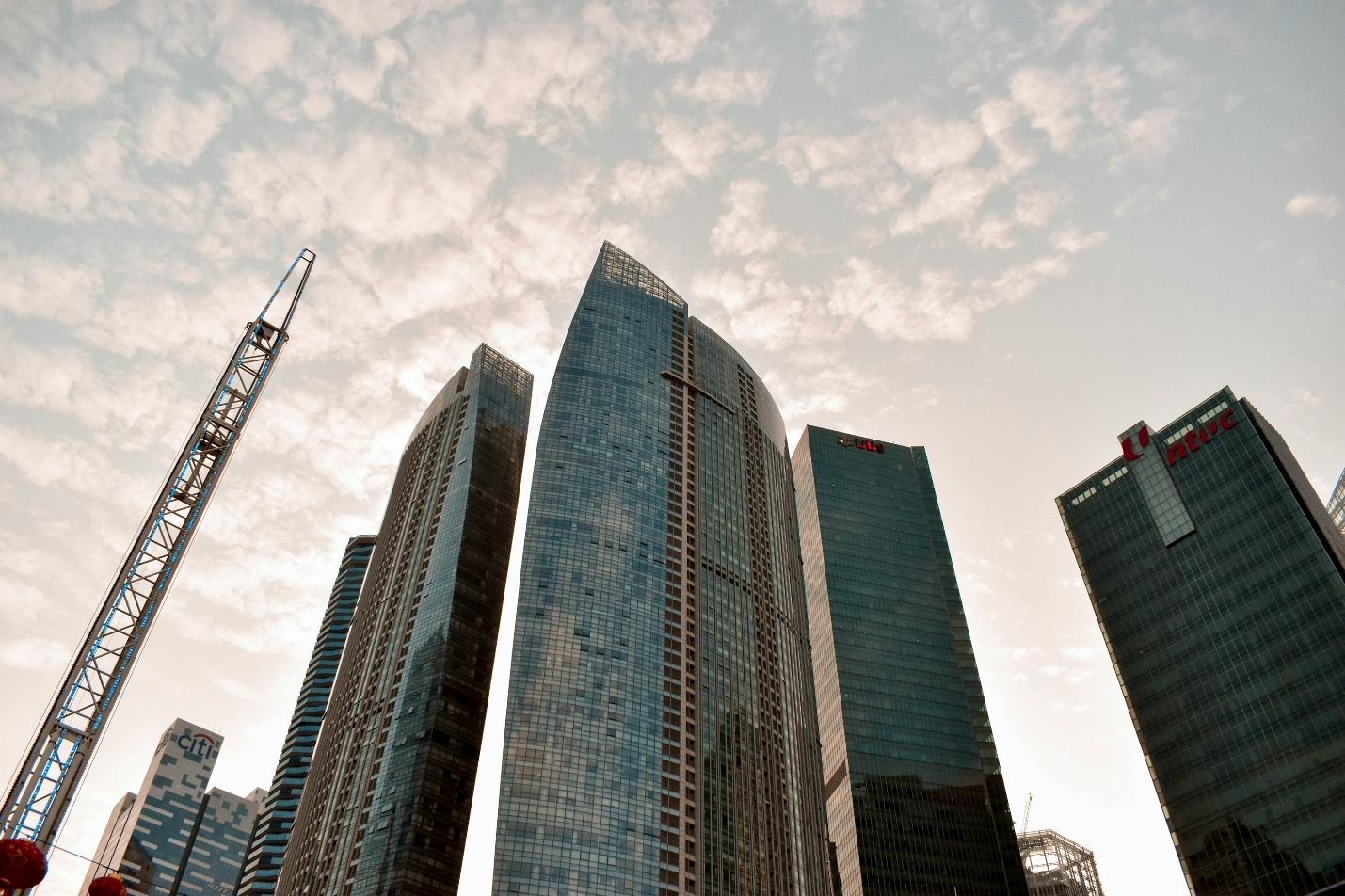 Glass skyscrapers representing institutional finance and digital asset infrastructure