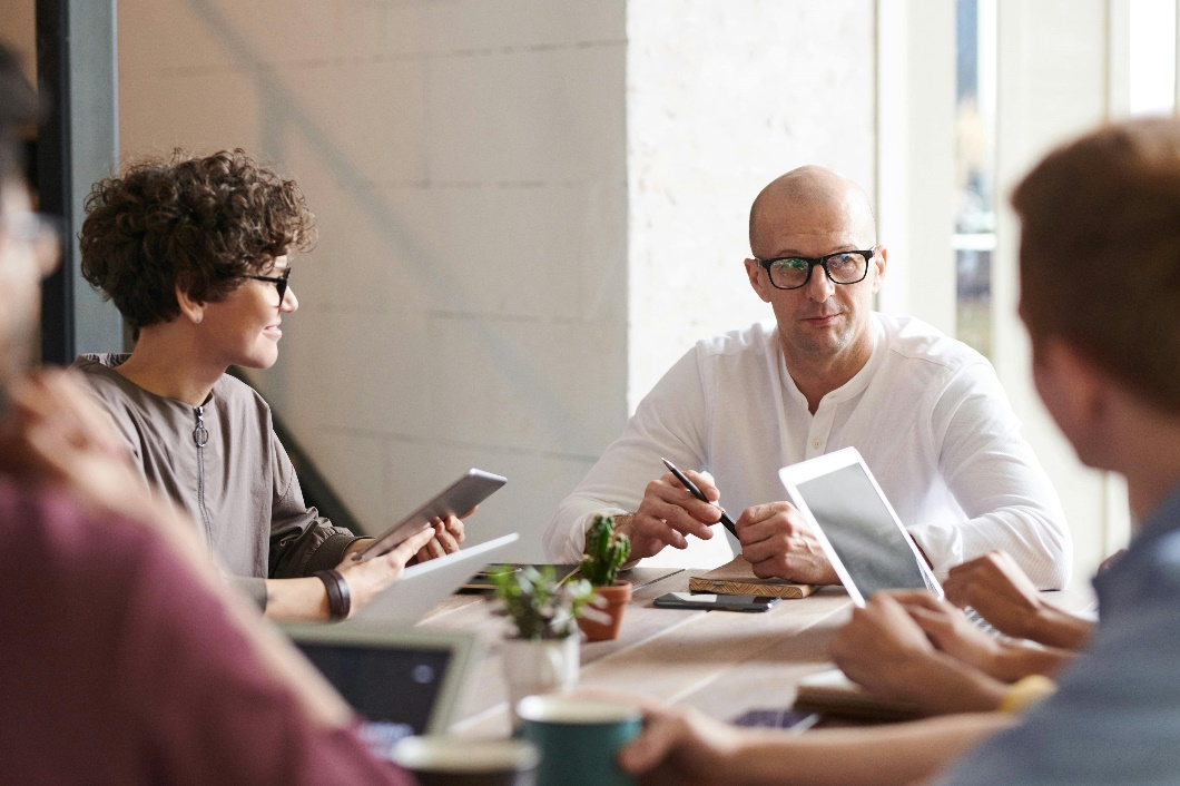 Fund managers discussing digital equity token structures