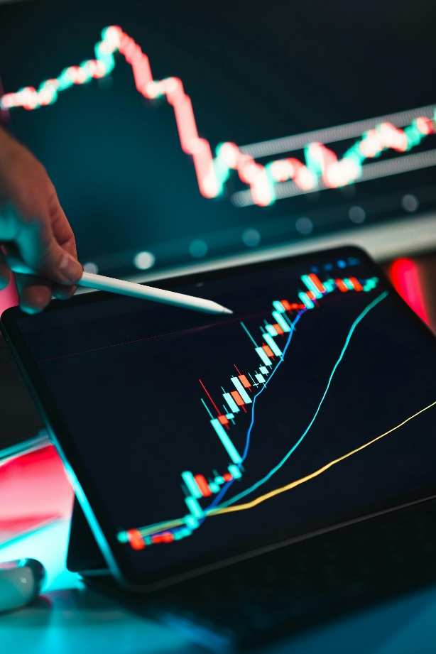 Person analyzing tokenized carbon credit data on digital tablet